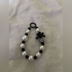 Elegant Black and White Beaded Phone Wristlet